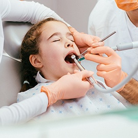 Young girl resting in dental chair