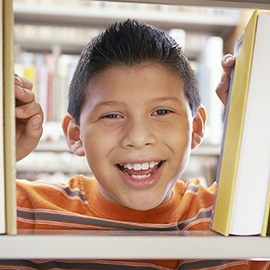 Smiling boy at the library