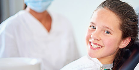 Smiling young child in dental chair